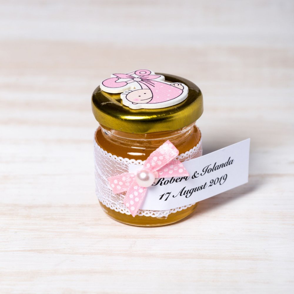 Marturii botez borcanele miere cu figurina bebelus roz